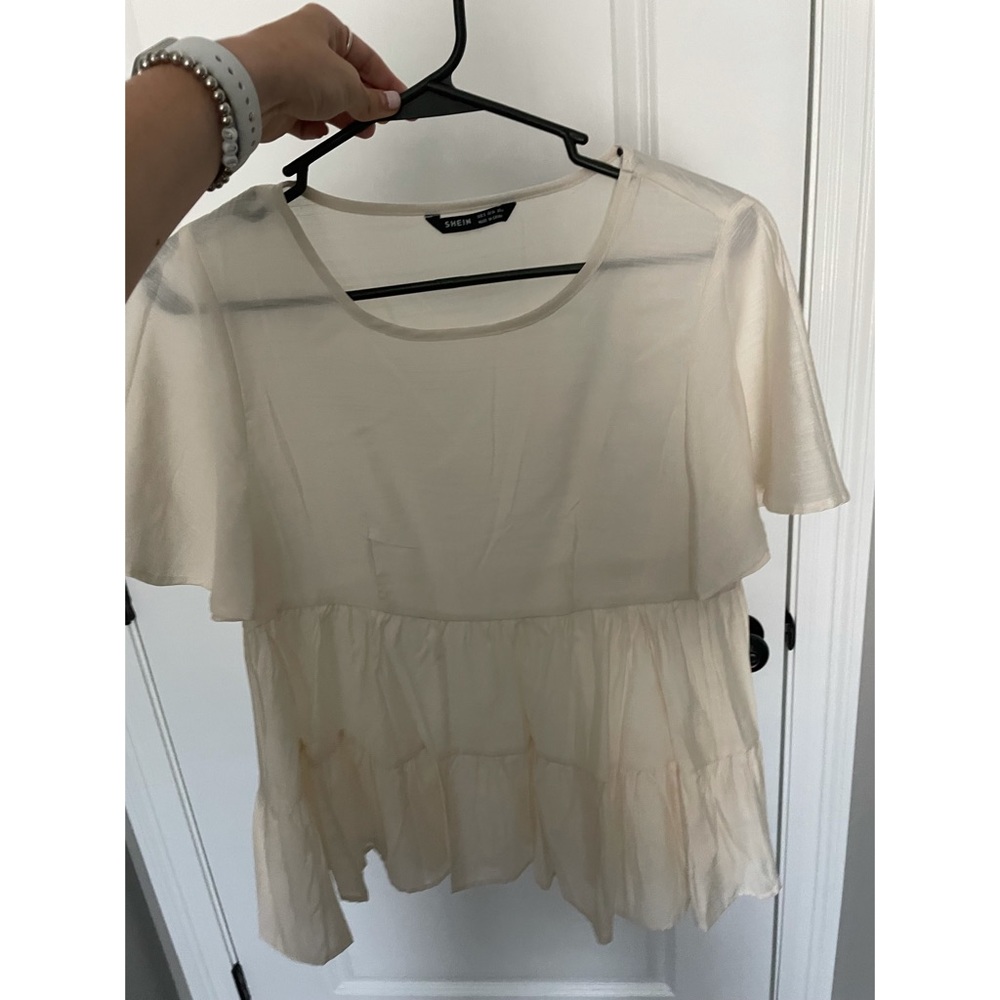 Tan tiered top